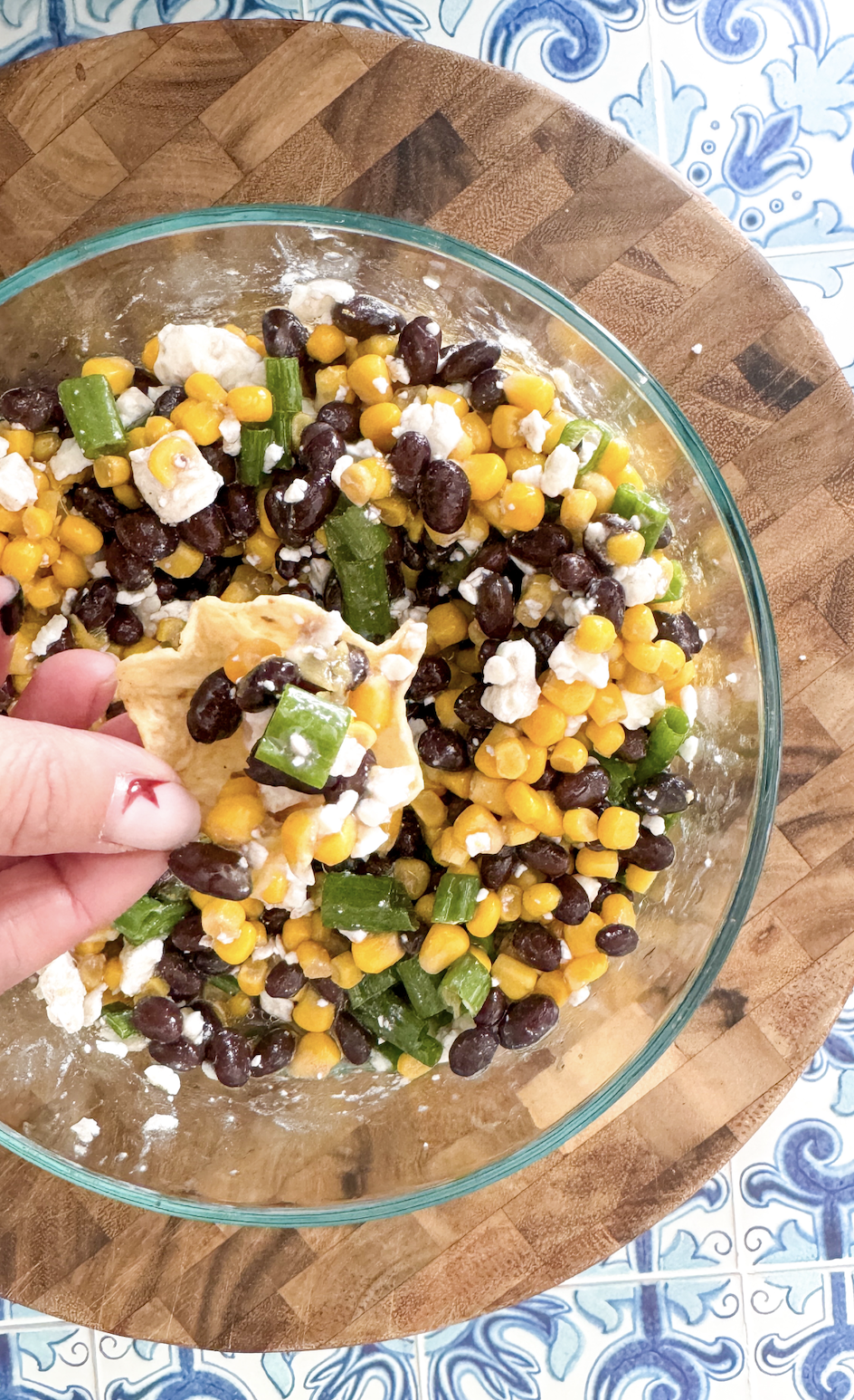 This chilled black bean and corn dip recipe is my go-to appetizer for all occasions & loved by everyone! It's simple, healthy & so addictive!